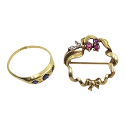 9ct gold ruby and diamond circular bow brooch, hallmarked and a gold sapphire and diamond ring stamped 18ct