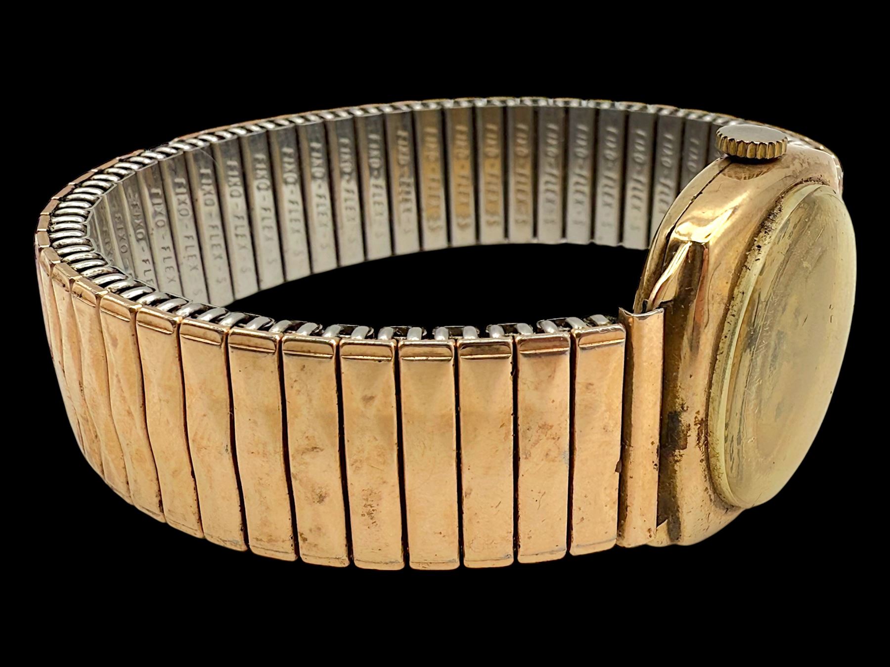 J W Benson 9ct rose gold manual wind wristwatch, the back case engraved with initials CM, Birmingham 1942, on expanding gilt strap 