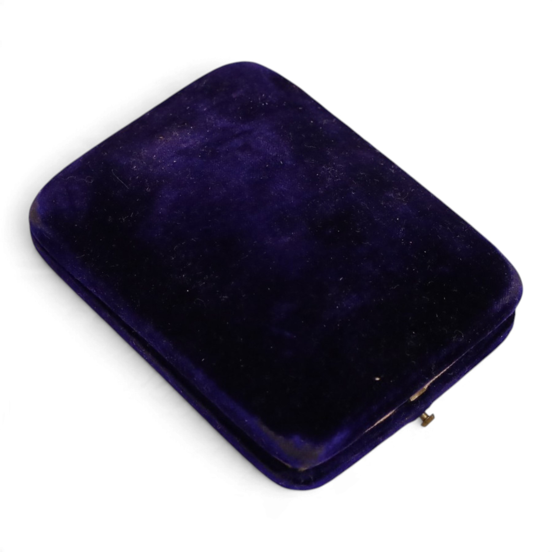 Art Deco Bakelite cigarette case, of rectangular form, the hinged lid with applied platinum monogram, millegrain set with rose cut diamonds