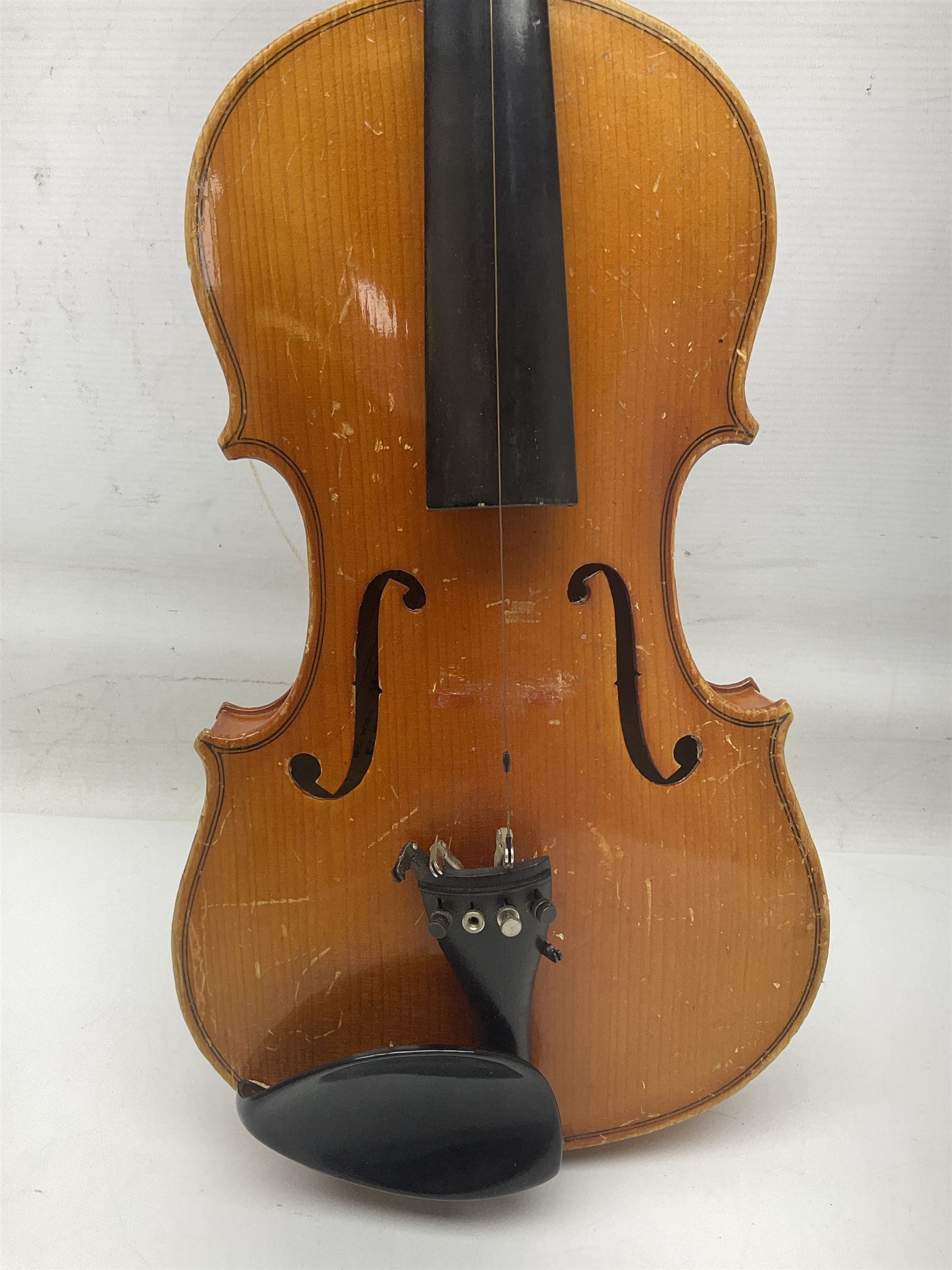 Four Chinese graduated violins - full size with 35.5cm two-piece back; three-quarter size with 33.5cm two-piece back; half size with 31cm two-piece back; and quarter size with 27.5cm two-piece back; all cased except full size; one with bow (4)