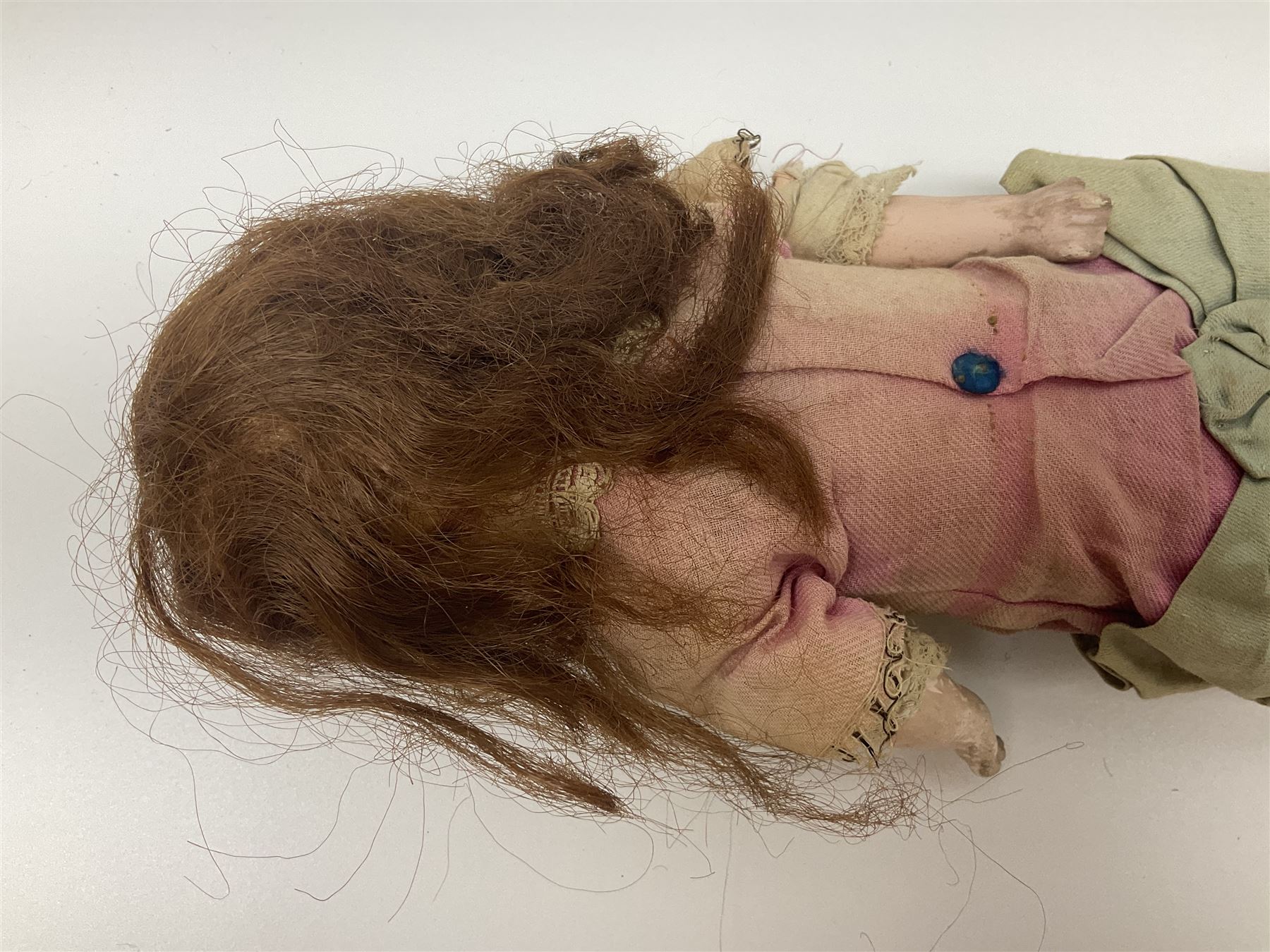 Victorian wax shoulder head doll with applied hair, inset glass eyes and jointed body with composition lower limbs; faded pink dress H35cm