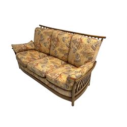 Ercol - 'Renaissance' three seat sofa, loose cushions upholstered in patterned fabric