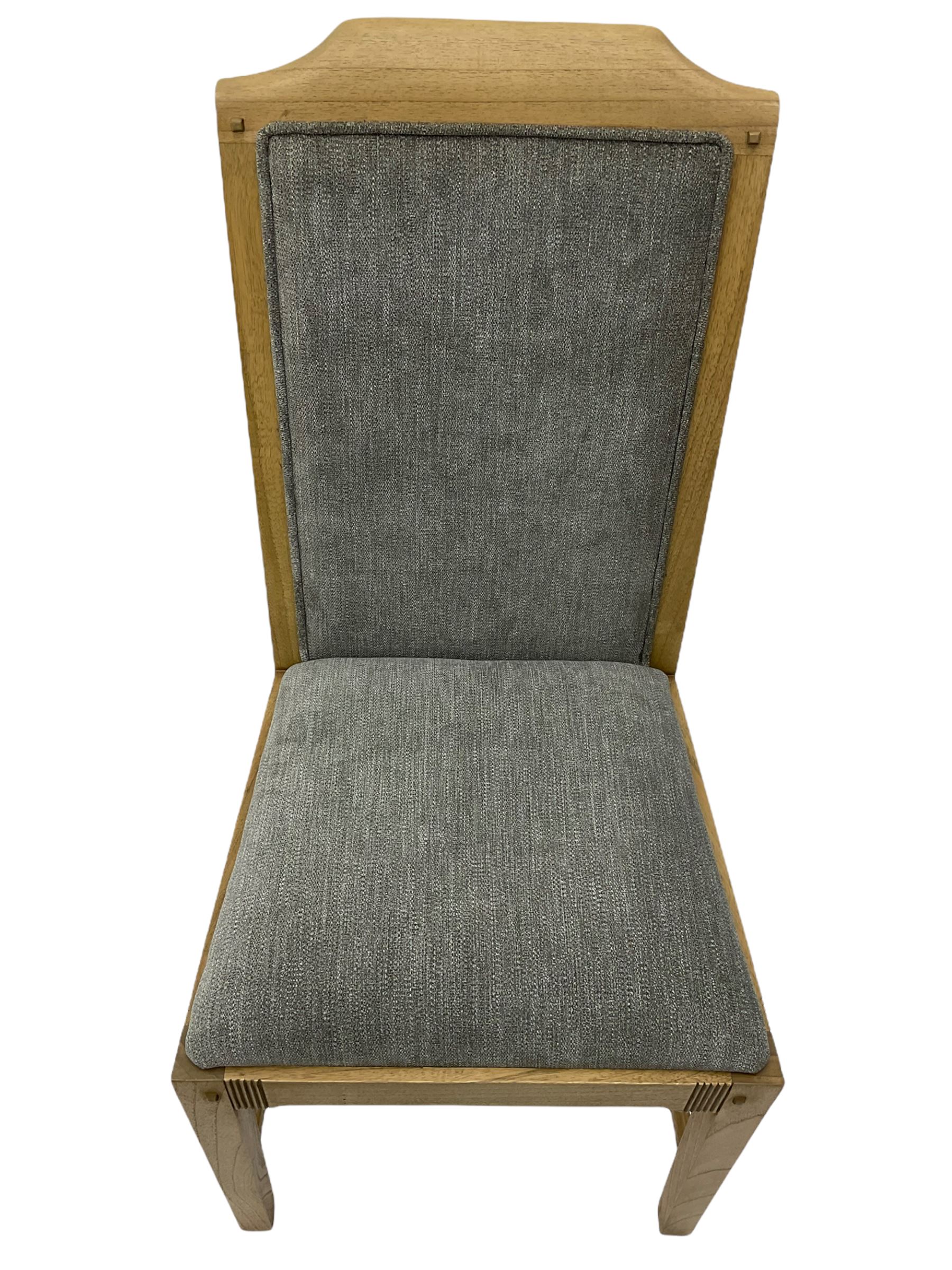 Windsor by Mark Devany oak rectangular extending dining table, with butterfly leaf, and four chairs with upholstered seats and backs
