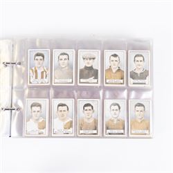 Collection of Edwardian and later Football related trading and cigarette cards, including forty-nine of fifty 1906 Ogden's Football Club Colours, 1922 PALS Footall series, ninety of one hundred 1925 Gallaher Famous Footballers, complete set of forty-four 1926 Ogden's Captains of Association Football Clubs and Colours, complete set of fifty 1927 Players Football Caricatures by MAC,  complete set of fifty 1927 Players Football Caricatures by RIP,  complete set of fifty 1930 Players Association Cup Winners, complete set of 50 1933 Ogdens AFC Nicknames etc, housed in brown cigarette card album