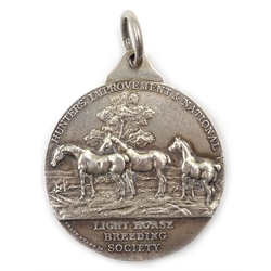  Silver medal 'Light Horse Breeding Society - Hunters' Improvement' 1928, raised hunting and pastoral paddock scenes front and back by Joseph Moore Birmingham 1927 42gm  