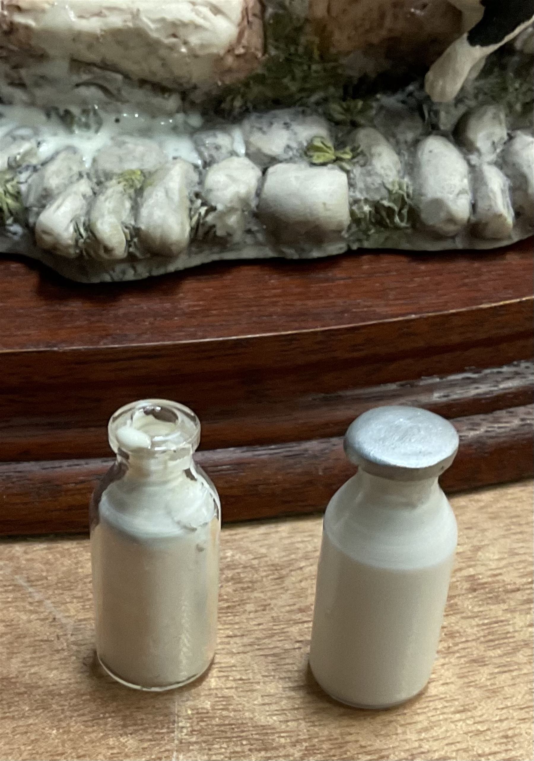 Border fine arts figure, Border collie, model no MT07, by M Turner H22cm, along with Border fine arts figure Spilt milk, model number JH99, by Ray Ayres H15cm.