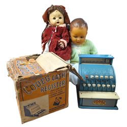 Codeg child's cash register, boxed, a 1930's Societe Nobel Francaise (SNF) doll and another vintage doll