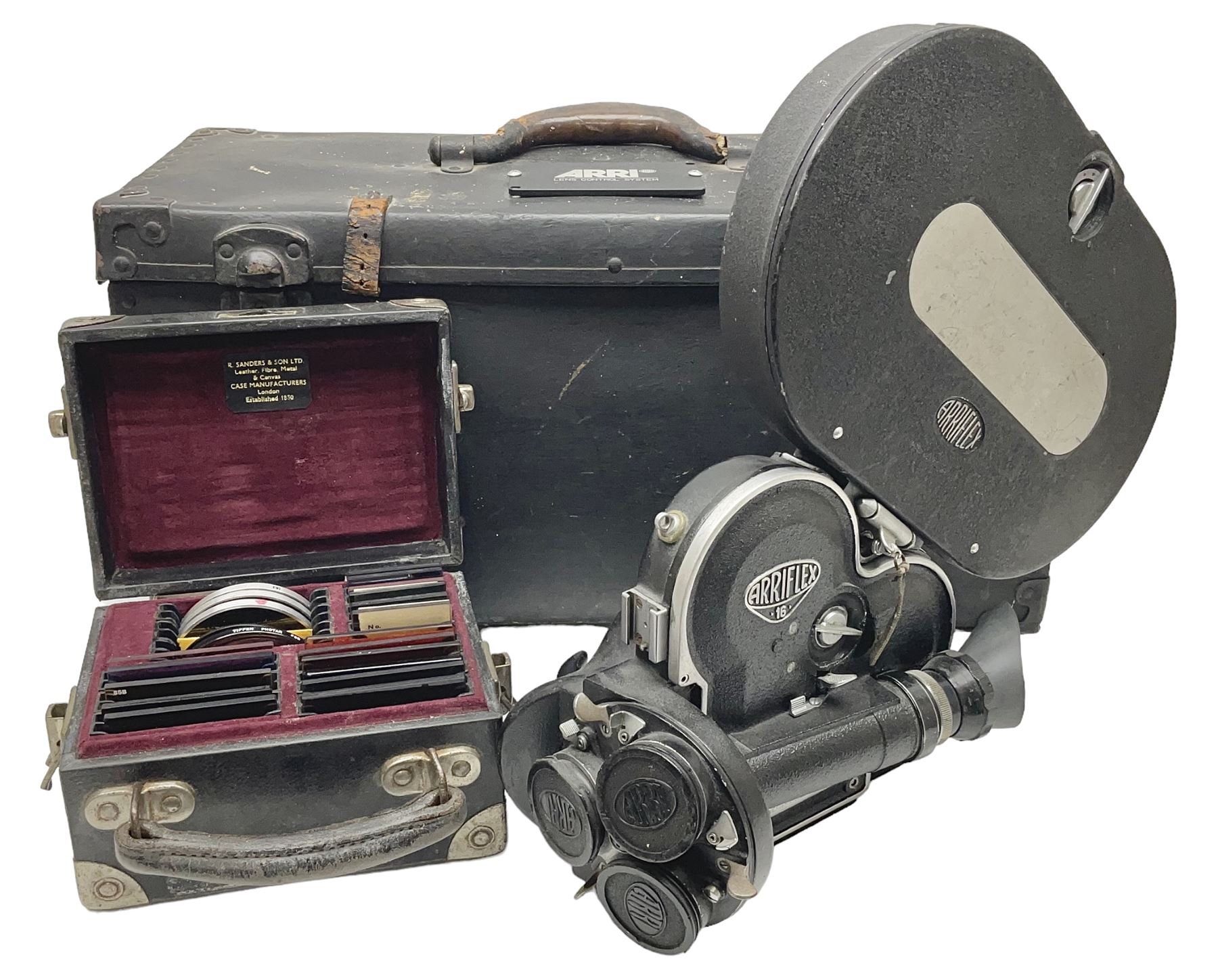 Arriflex 16 camera body, serial no. 11250, three 400ft magazines, cased filter set, 'Angenieux-Zoom Type 4x17.5B F.17.5-70mm' lens, serial no. 1199886 cases and other Addiflex equipment in hard case 