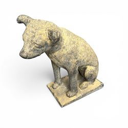 Cast stone garden statue in the form of a seated Jack Russell Terrier on a rectangular base