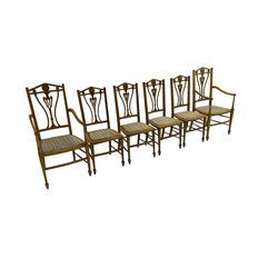 Set six (4+2) Edwardian satinwood dining chairs, triangular cresting rail painted with laurel wreath, shaped and pierced splat flanked by two shaped upright rails, with boxwood stringing, upholstered seats, on square tapering front supports with spade feet