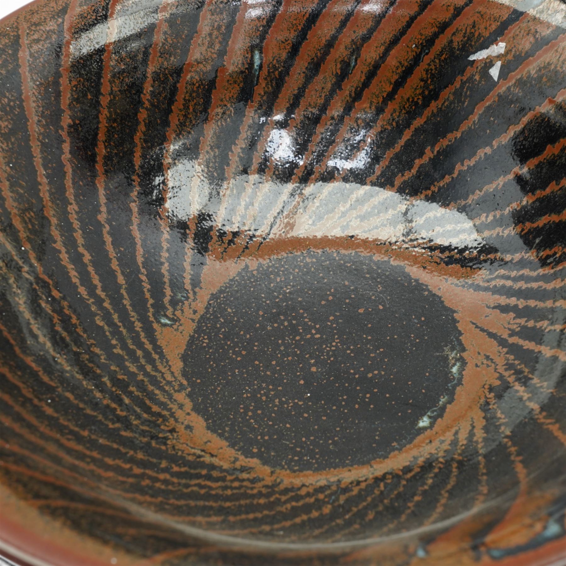 Andrew Crouch (British 1955); large studio pottery bowl and similarly patterned planter, in shades of black and brown, planter H22cm bowl D37c m (2)