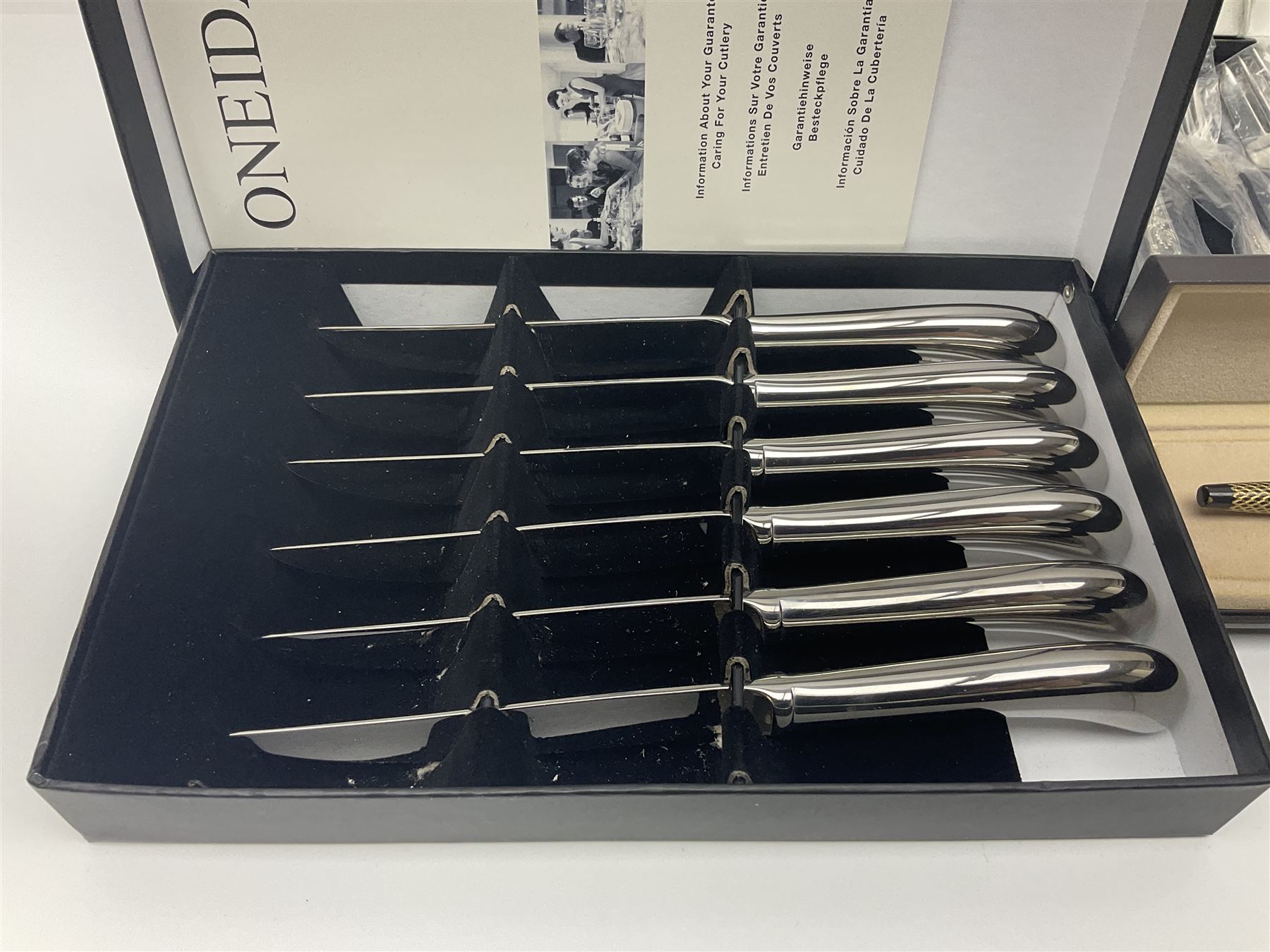 Silver plate including set of six Oneida steak knives with pistol grip handles, in original box, set of six cased cake forks, pair of goblets, etc, together with a pair of Belleek Celtic pattern mugs, 