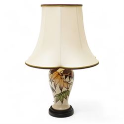 Moorcroft Sumac Tree pattern table lamp, designed by Phillip Gibson, the body decorated wi...