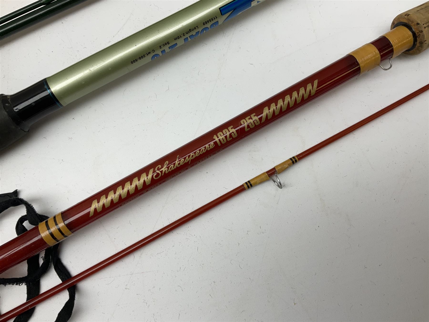 Quantity of fly and sea fishing rods and accessories, to include Shakespeare Boat 210 rod, Daiwa rod and others, and Guang Zhao FLD9000 course fishing reel, Beachmaster 7000FD, Rimfly II amd Penn Super Mariner, tackle etc