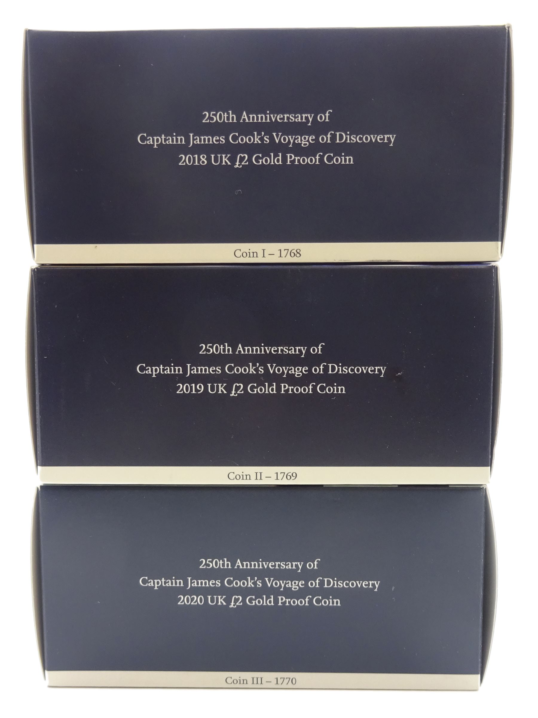 Captain Cook gold proof three coin series, comprising 2018, 2019 and 2020 dated gold proof two pound coins, all three housed together in a Royal Mint presentation box, the individual boxes and certificates are also present