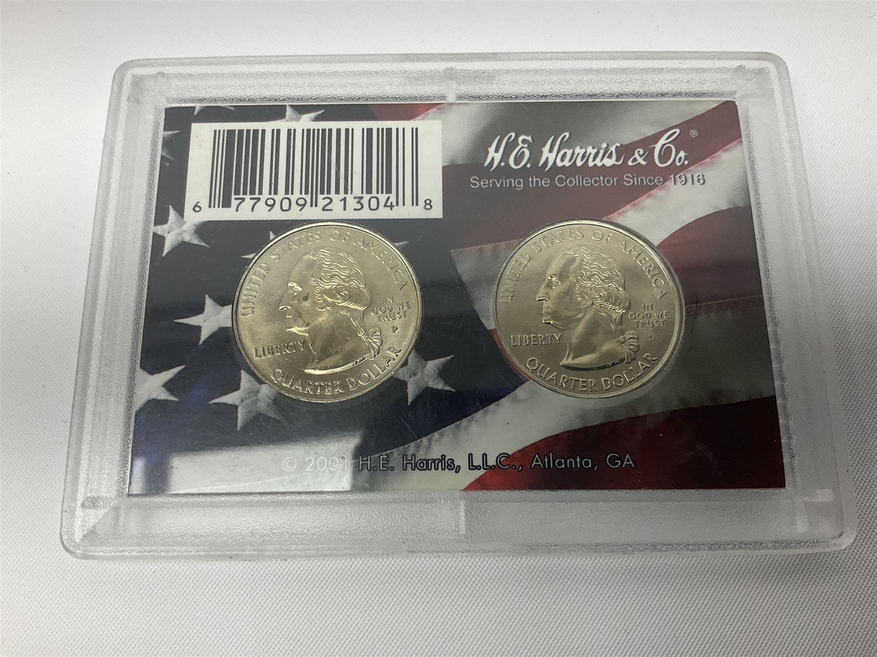 United States of America coinage, including 1876S half dollar (holed), various quarter dollars, 1986 one ounce fine silver dollar, 1988 uncirculated coin set etc