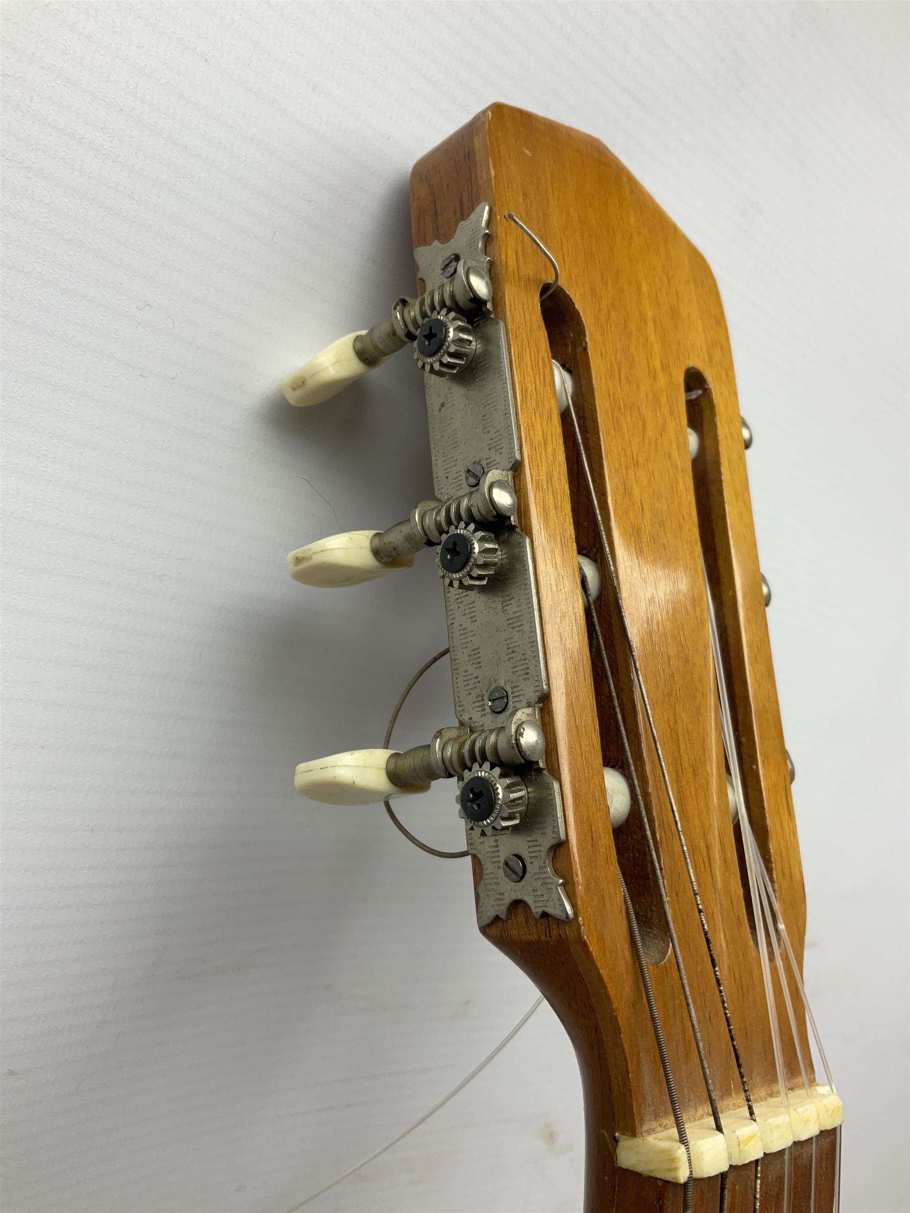 Encore black electric cut-away guitar L96cm; and Spanish Victor Garcia model 187 acoustic guitar, bears label dated 1972 L99cm; each in soft carrying case (2)