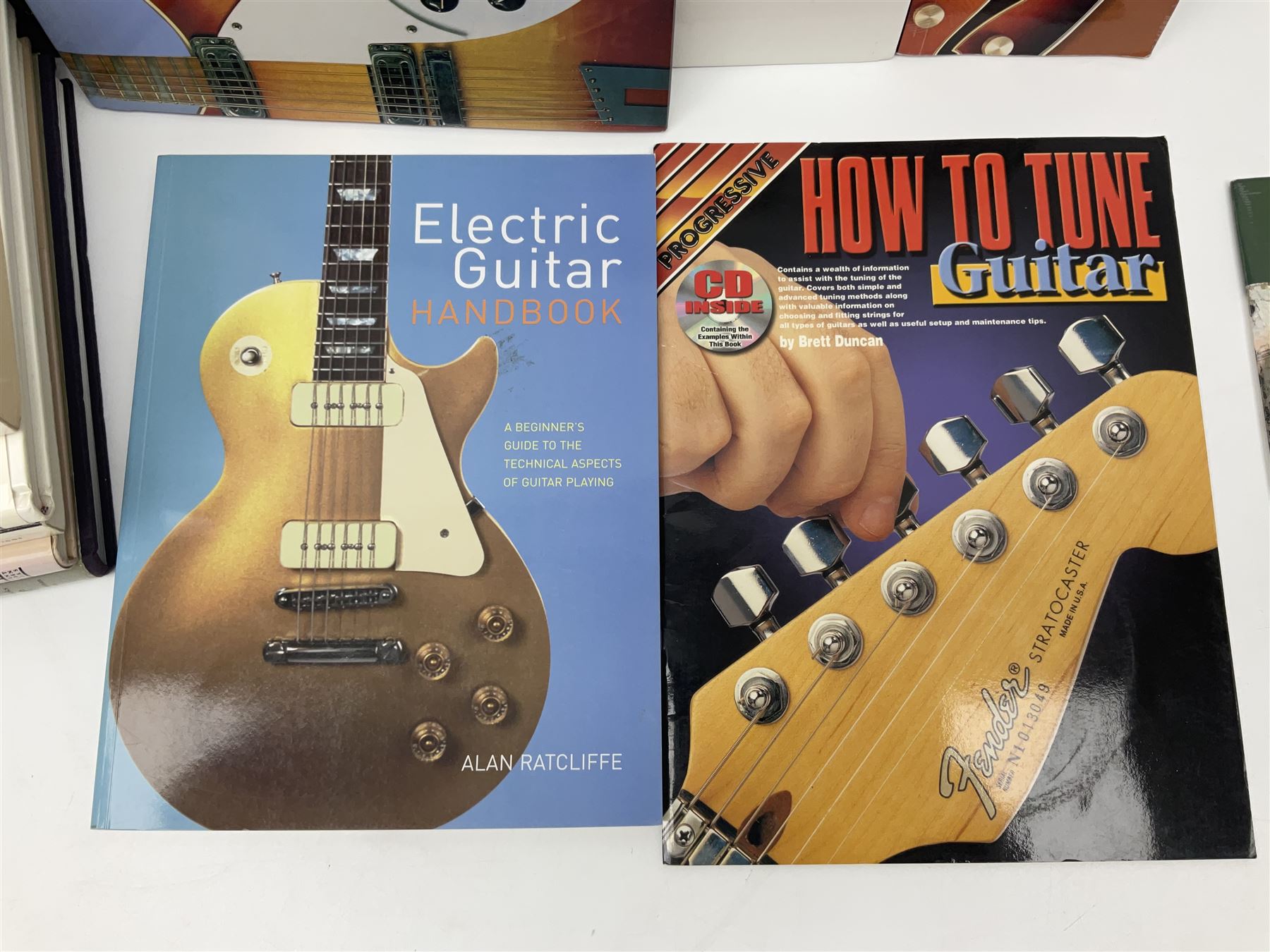 Seventeen modern books on guitars and guitar playing including The Classic Guitars of the 50s and 60s; The Acoustic Guitar by Freeth & Alexander; Electric Guitars - An Illustrated History by Jonathan Lister; Electric Guitars and Basses by Gruhn & Carter; Acoustic Guitar White Pages; The Ultimate Guitar Book by Tony Bacon etc