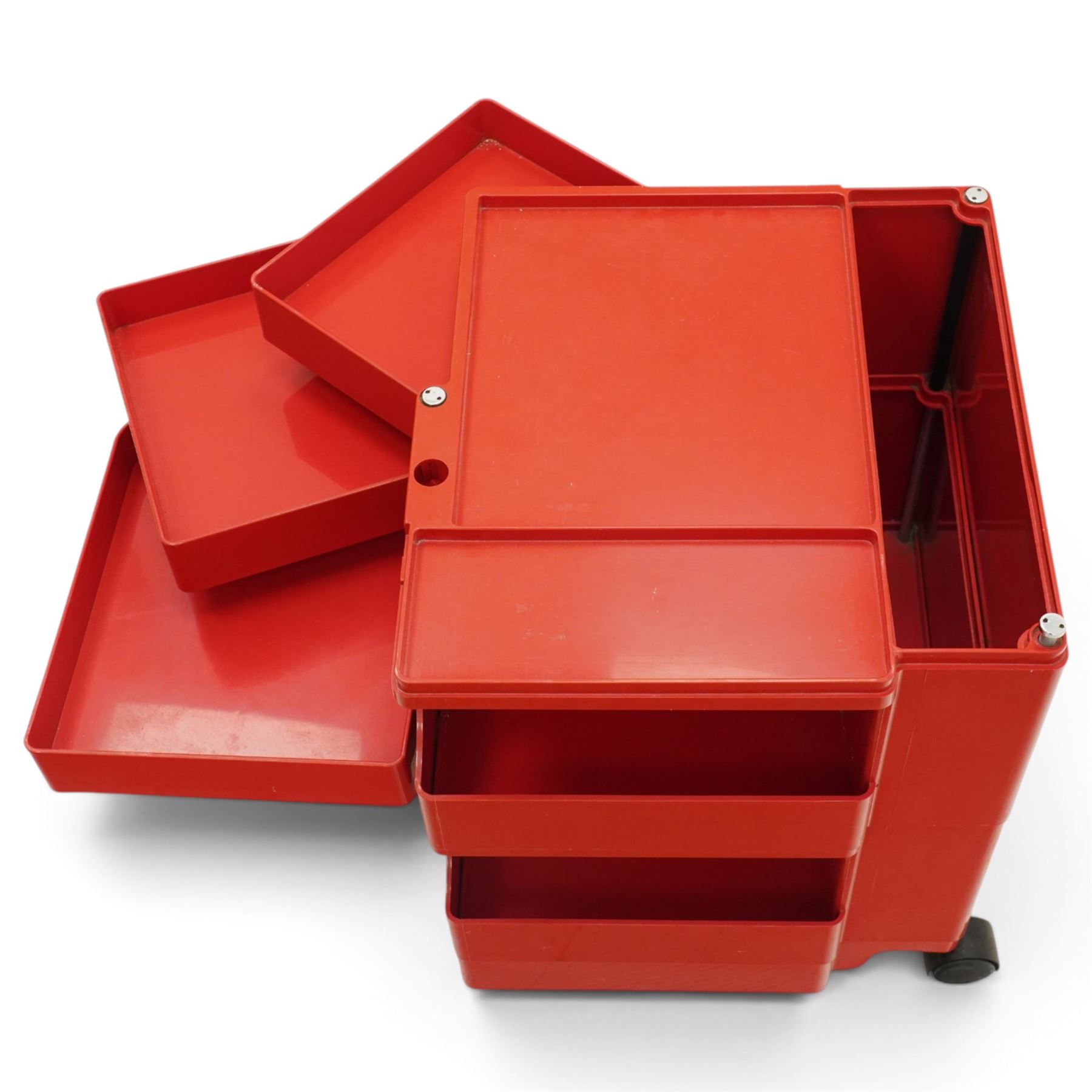 Joe Colombo (Italian 1930-1971) for Bieffeplast - 'Boby' red trolley circa 1970s, rectangular tray top above three pivoting drawers, open storage compartments raised on castors