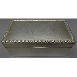  Edwardian silver presentation rectangular cigarette box, the slightly domed hinged lid engraved with crossed flags colours and inscribed 'Presented to the Officers 5th Batt. Prince of Wales Own Yorkshire Regiment by Col.J.C.R.Husband V.D. on appointment to the Command 10th June 1908. Reproduction of the Colours Presented by H.M.King Edward VII Windsor June 19th 1909' within an embossed border of panther heads, cedar lined, hallmarked London 1909 W17cm  