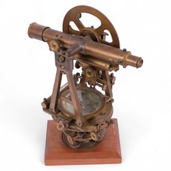 19th Century brass transit theodolite by Troughton & Simms, the sighting telescope with rack and pinion focusing above an inset compass, upon four levelling feet and a rectangular wooden base, including base H35.5cm