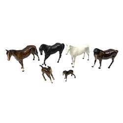 Six Beswick horse figures, comprising two Bois Roussel Racehorses, in bay and grey,  No. H701, bay mare no 976, black beauty no.H2466, bay comical-type foal 728 and bay foal 1816, all with printed mark beneath 