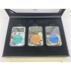 Queen Elizabeth II Bailiwick of Guernsey 2019 'The Titanium Moonlanding' fifty pence three coin set, comprising 'Green', 'Orange' and 'Blue' titanium coins, in capsules and case with certificate