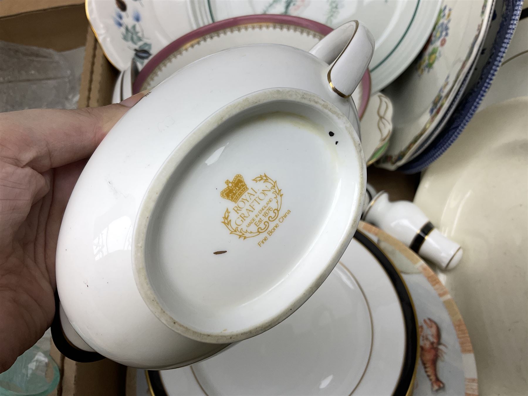 Set of four contemporary Mosa Holland tiles, three further tiles, Grayshott pottery clock, motto ware teacup and saucer, jug and mug, Royal Albert Old Country Roses, Chinese mud men figures, Spode etc and Quantity of ceramics and glassware to include art glass vase, Royal Grafton, Royal Doulton and Colclough dinner wares, Poole, copper lustre, vases etc in six boxes