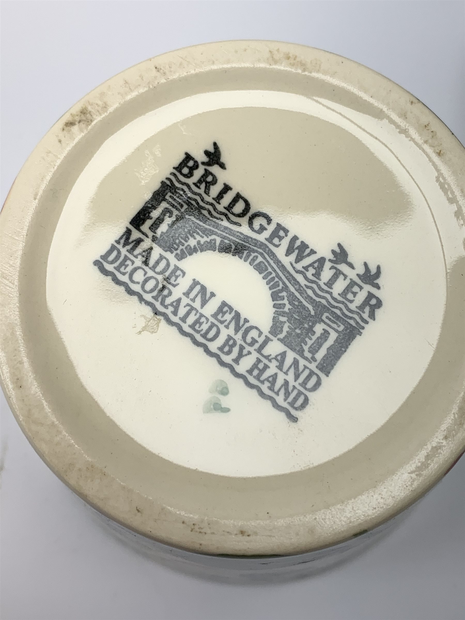 Four Emma Bridgewater mugs, together with a jug, and preserve pot and cover, decorated in sweet pea pattern, mugs H7cm. (5). 