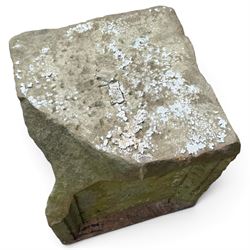 Two 18th century carved sandstone architectural elements, comprising a substantial square pedestal block with recessed panelled facias (W42cm H45cm); and a frieze fragment carved in relief with three stylised flowerheads and an undulating foliate stem (W30cm H18cm)