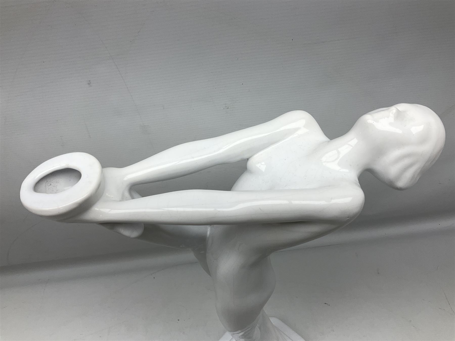 Art Deco style lamp modelled as a nude female dancer, with draped folds of linen, H46cm