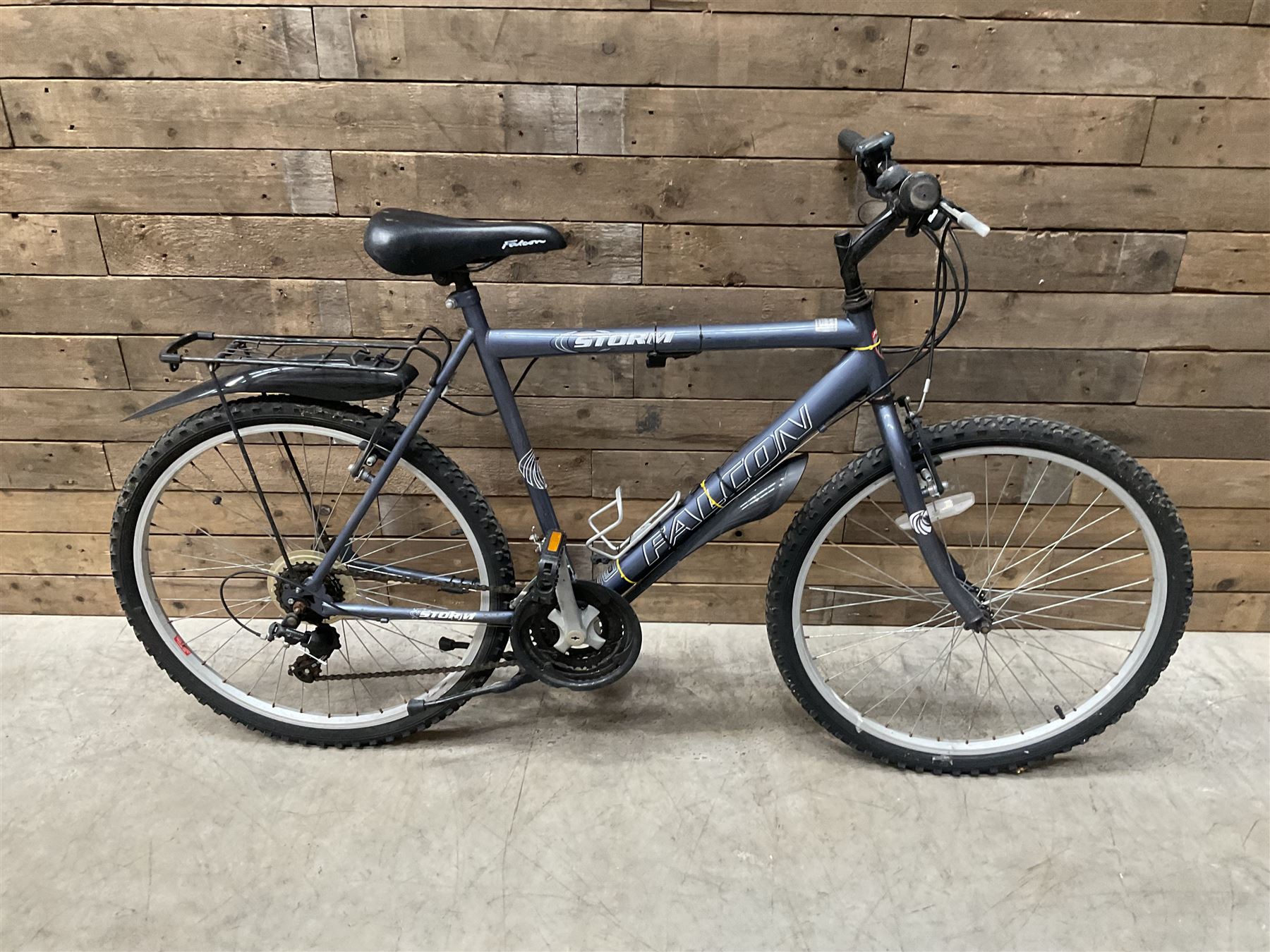 Three bicycles- man’s Falcon Storm 18 speed mountain bike; lady’s Dawes Sonoran 24 speed road bike; child’s Apollo 18 speed bike (3)