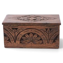 Carved oak box, the hinged lid with a carved diamond motif, the sides and front carved with stylised flowers, H12cm, L24cm