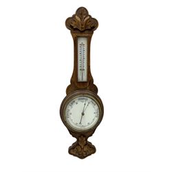 Early 20th century carved oak aneroid barometer