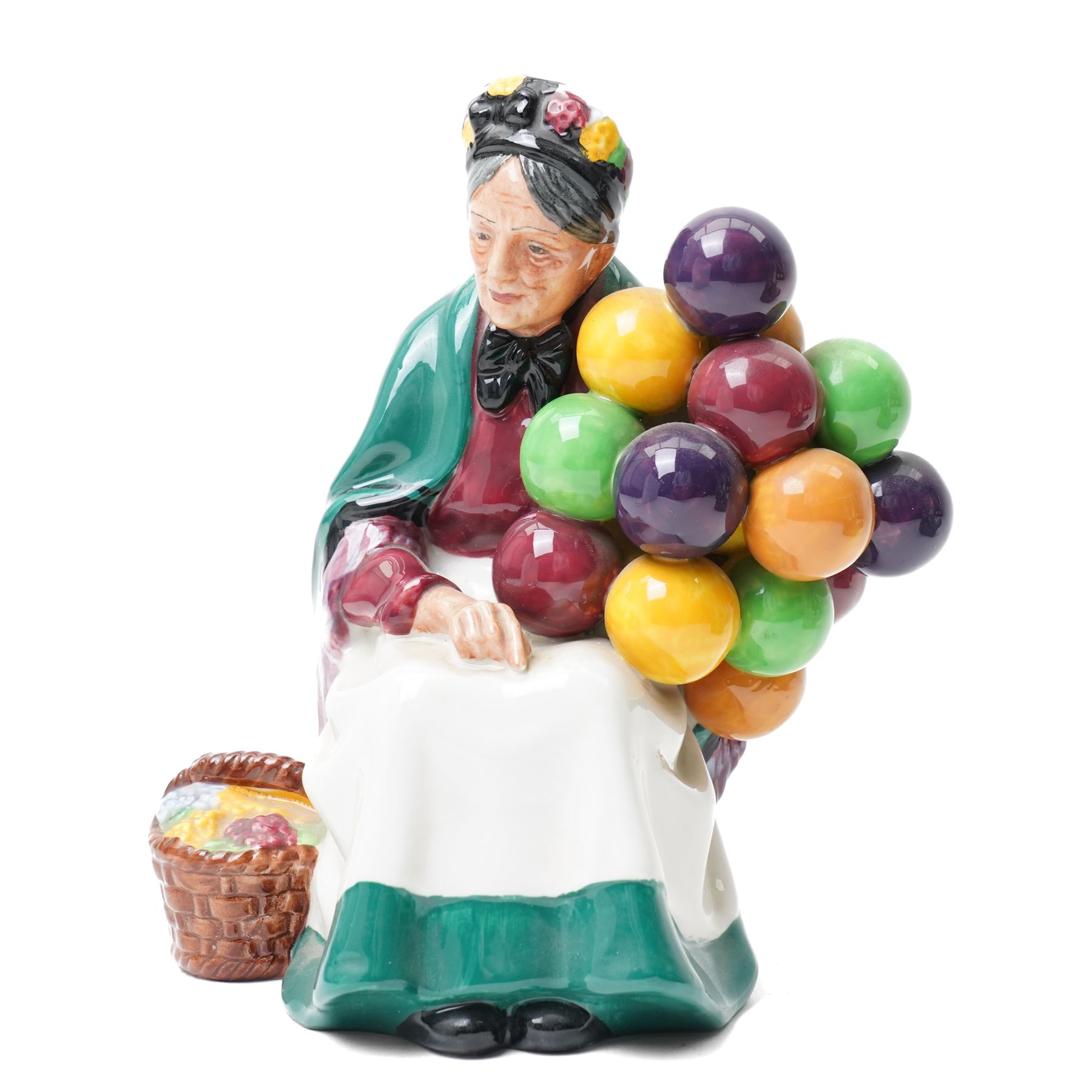 Five Royal Doulton figures comprising The Master HN2325 , Thanks Doc HN2731, signed,  Nanny HN2221, The Laird HN2361 and The Old Balloon Seller HN1315 