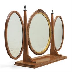 And So To Bed - 'Louis XV' triple dressing table mirror, central circular bevelled mirror, enclosed by parcel gilt with carved edge, flanked by two oval mirrors, the base with a well for trinkets 