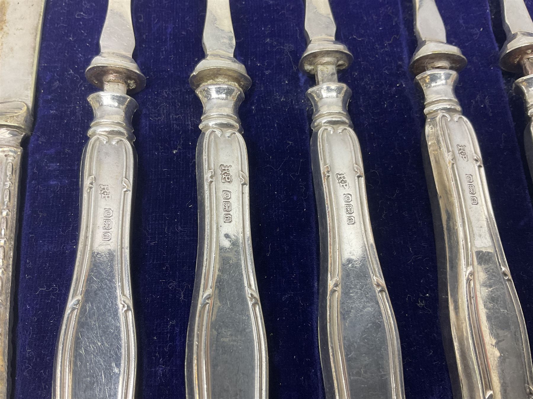 Cased set of six silver handled dessert knives and forks, hallmarked 