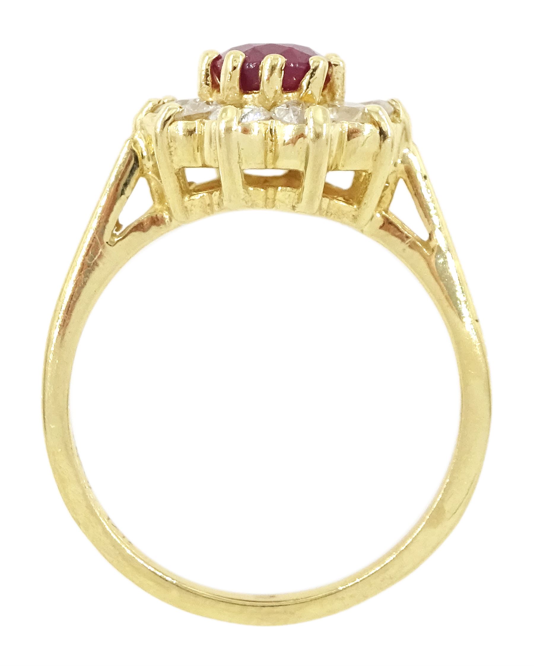 14ct gold oval cut ruby and round brilliant cut diamond cluster ring, stamped, ruby approx 0.90 carat, total diamond weight approx 0.50 carat