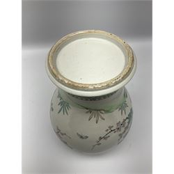 Oriental provincial style vase, of baluster form decorated with peacocks and peonies, H26cm 