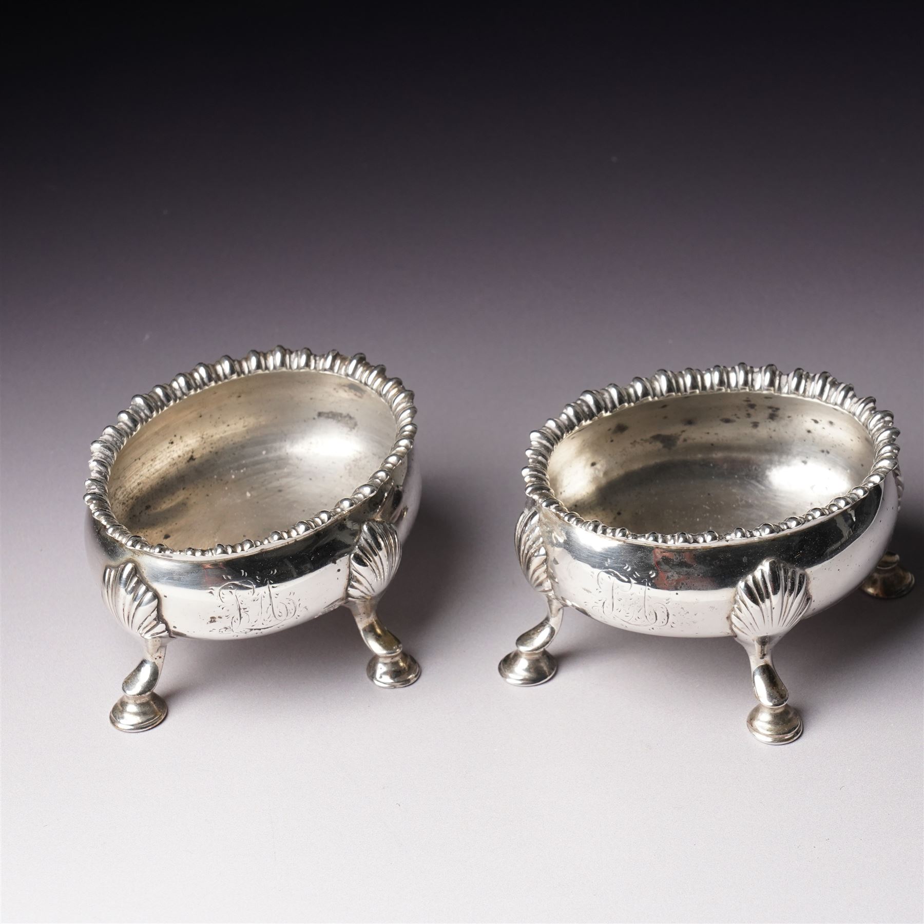 Pair of early George III silver oval salts with moulded rims and on four shell moulded supports W8.5cm London 1867 Maker D & R Hennell
