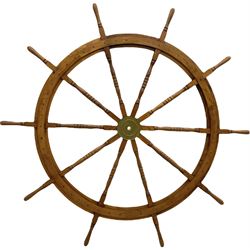 Very large 20th century walnut ship's wheel with ten turned spokes and brass central boss, D175cm