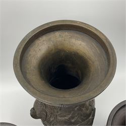 Chinese bronze vase, of baluster form with elongated neck, decorated in relief with birds amongst prunus blossom, together with a smaller pair of twin handled bronzed vases, decorated with peacocks and a blue Peking glass dish, with white metal mounted decorated with dragons, bronze vase H23.3cm