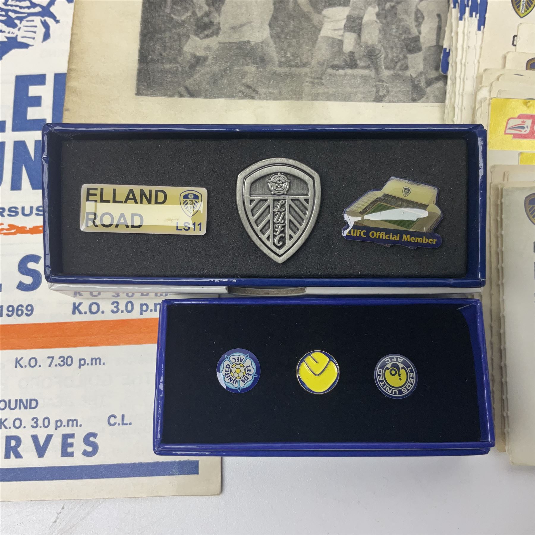 Leeds United football club - football association challenge cup competition final Saturday 11th April 1970 Chelsea vs Leeds United at Wembley programme, football association charity shield Saturday 10th August 1974 Leeds United vs Liverpool programme, various supporters pin badges, scarf for the league 1 playoff final Wembley stadium 25th May 2008, Danbury Mint 'Great Moments in the History of Leeds United' leather bound collectors edition, various used home game tickets etc