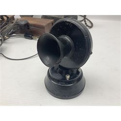 Collection of phone headsets, including GPO bakelite examples, together with other telephone parts 