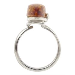 Silver marquise shaped Baltic amber adjustable ring, stamped 925