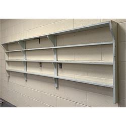 Victorian painted pine three height plate rack, with restoration to one end. L315cm, H96cm, D18cm. 