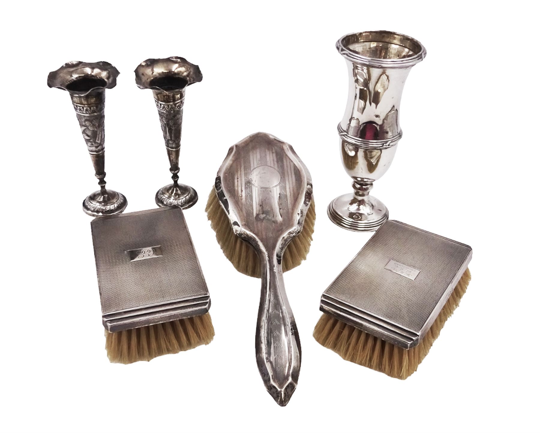 Early 20th century silver vase, of waisted form, with reed and bow border, upon knopped stem and filled circular stepped foot, hallmarked William Comyns & Sons, London 1911, H15cm, together with pair of Indian silver trumpet vases, with chased and embossed floral decoration, a pair of silver mounted clothes brushes, hallmarked Deakin & Francis Ltd, Birmingham 1946  and a 1920s silver mounted hairbrush, hallmarked W J Myatt & Co, Birmingham 1922