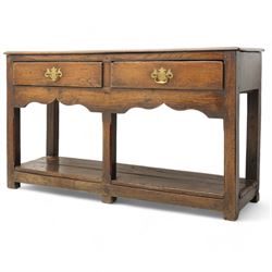 18th century oak dresser base, moulded rectangular top over two drawers and shaped apron, moulded drawer fronts fitted with shaped brass handle plates and swan neck handles, on chamfered square supports united by pot board base 