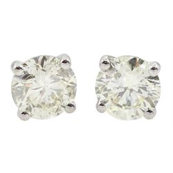 Pair of 18ct white gold round brilliant cut diamond stud earrings, total diamond weight 1.14 carat, with World Gemological Institute Report