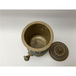 A late 19th century Doulton Lambeth stoneware water filter with original spigot, decorated with relief moulded foliate bands, with impressed marks and monogrammed for Laura Gooderham beneath, H34cm. 